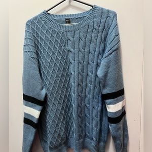 Mixed knit blue crewneck sweater with arm stripes